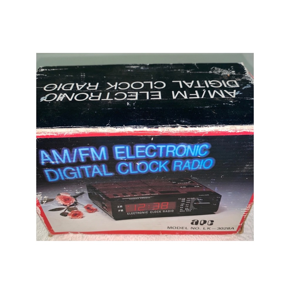 Vintage APC AM/FM Digital Clock Radio Simulated Wood Grain Space Age LED 3028A